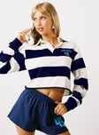 front view of model wearing Princess Polly USD Rugby Polo Navy / White Full Sleeves High Neck 