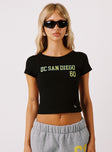 front view of model wearing Princess Polly UCSD Comeback Top Black Short Sleeves Crew Neck 