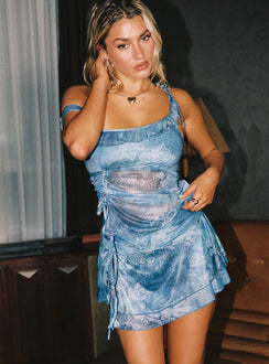 side view of model wearing Princess Polly Rosee Frill Mini Skort Blue Multi High Waisted Shorts 