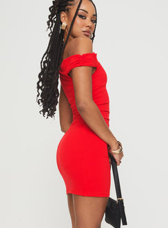 side view of model wearing Princess Polly Marcou Mini Dress Red Asymmetric Neckline 
