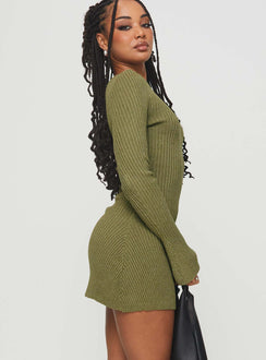 side view of model wearing Princess Polly Osment Long Sleeve Knit Mini Dress Olive Boat Neck 