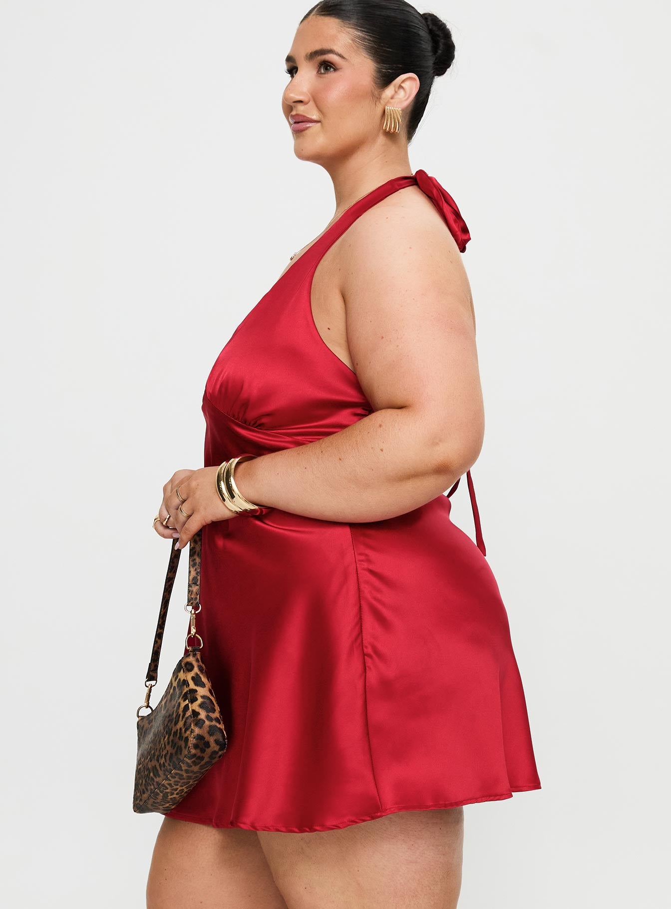 side view of model wearing Princess Polly Pelagia Halter Scarf Tie Mini Dress Red Curve Plunger 