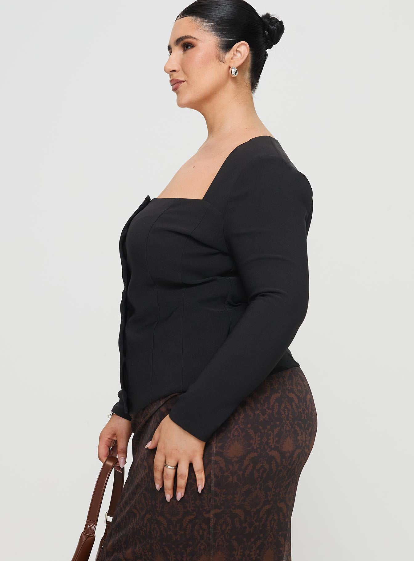 side view of model wearing Princess Polly Gaskin Long Sleeve Top Black Curve Full Sleeves Square Neck 