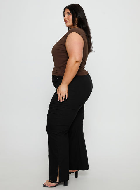 side view of model wearing Princess Polly Kortnee Eyelet Detail Flare Leg Pants Black Curve Mid Rise Pants 