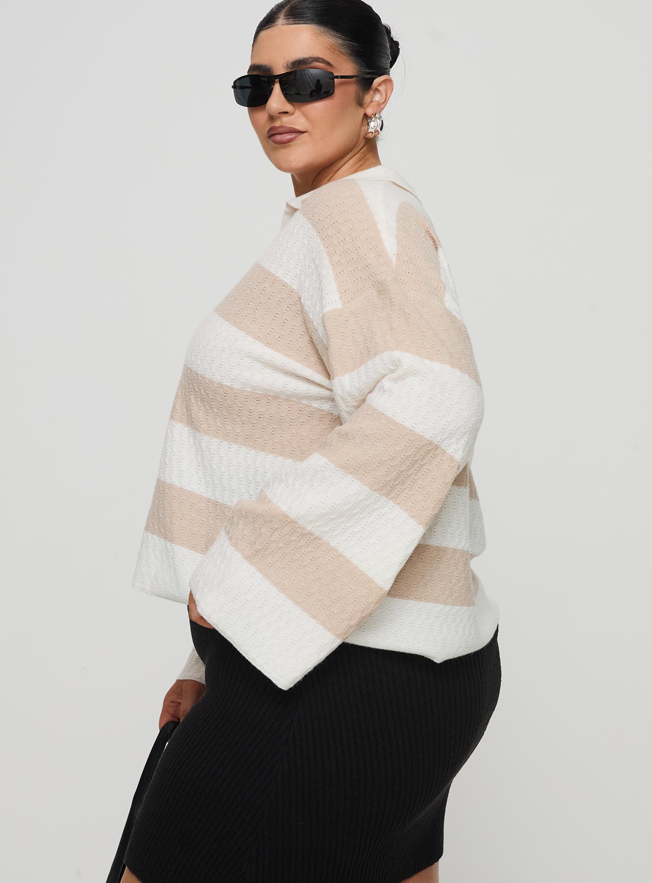 side view of model wearing Princess Polly Rick Sweater White / Beige Curve regular 