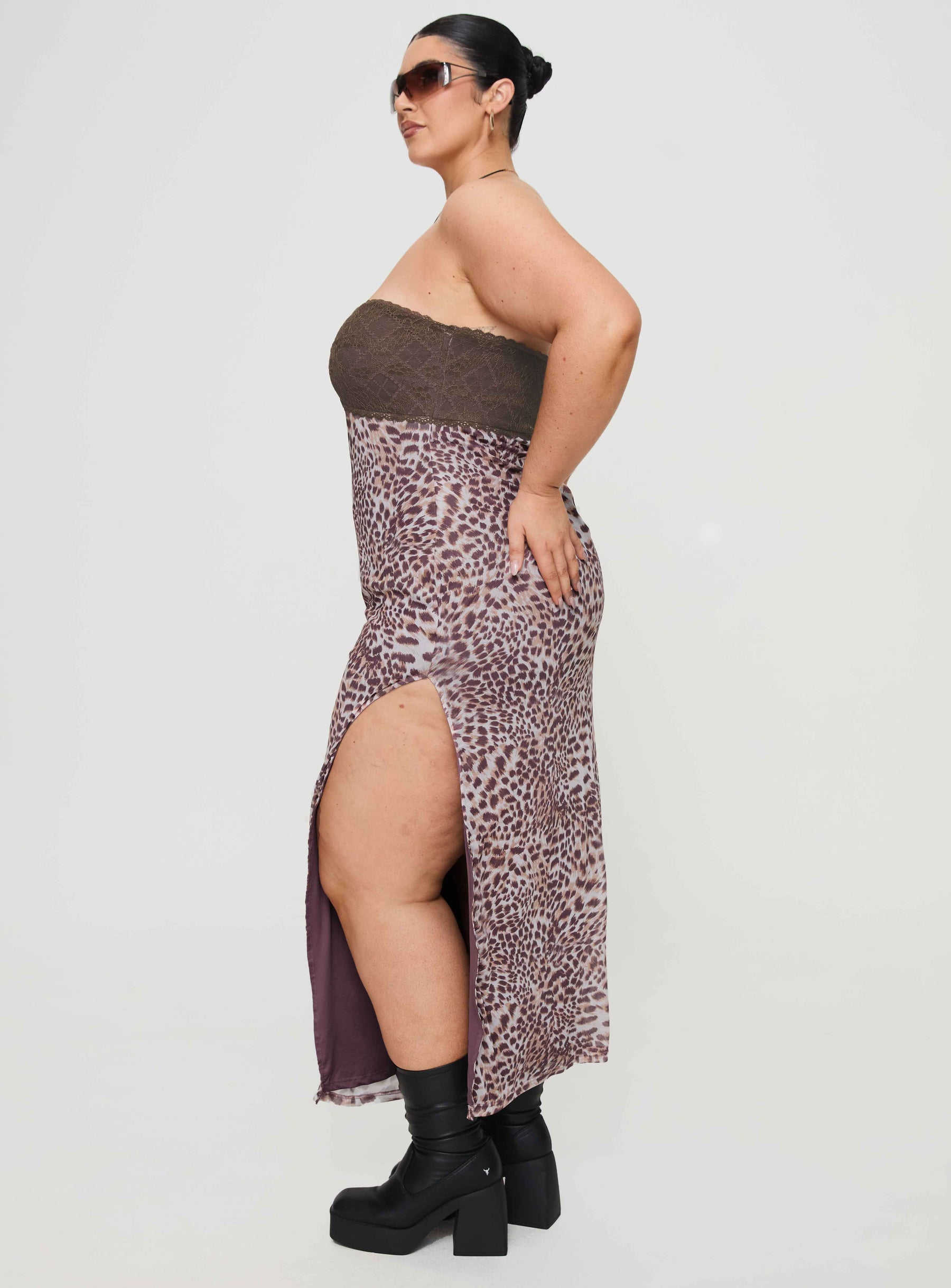 side view of model wearing Princess Polly Raidein Strapless Maxi Dress Leopard Curve Sweetheart Neckline 
