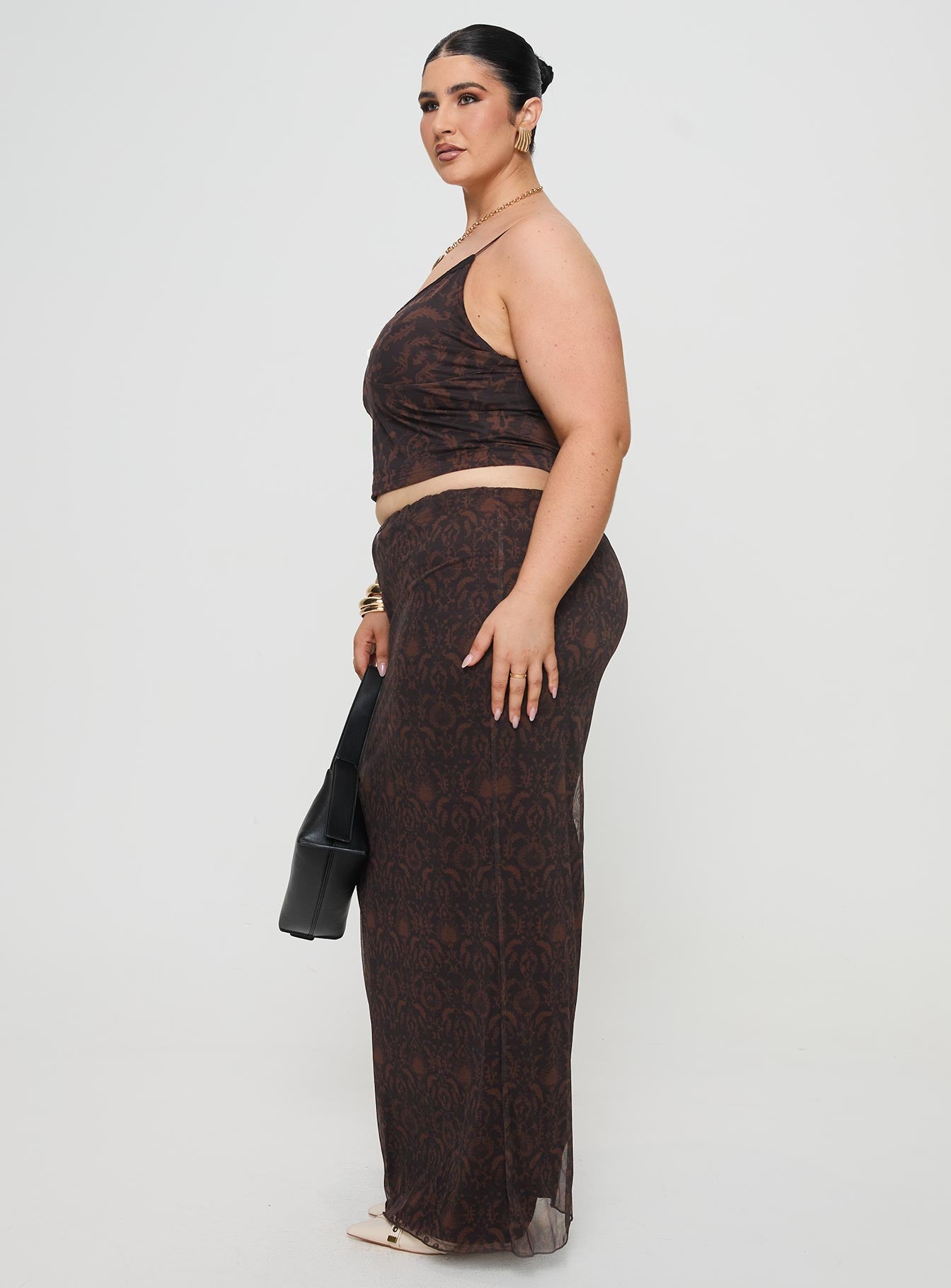   side view of model wearing Princess Polly Hostona Maxi Skirt Mutli Curve Maxi 