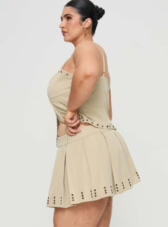   side view of model wearing Princess Polly Alinzia Eyelet Skort Beige Curve Mini Skirts 