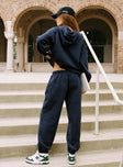 back view of model wearing Princess Polly Dream Fleece Ankle Cuff Sweatpants Navy High Waisted Pants 