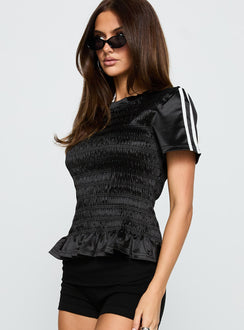 side view of model wearing Princess Polly Wildrose Shirred Top Black Short Sleeves Crew Neck 