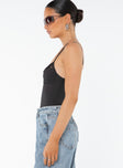 side view of model wearing Princess Polly Dalsi Bodysuit Black Sleeveless V-Neck 