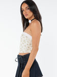 Strapless top Floral print Lace trim  Underbust seam Zip fastening at side