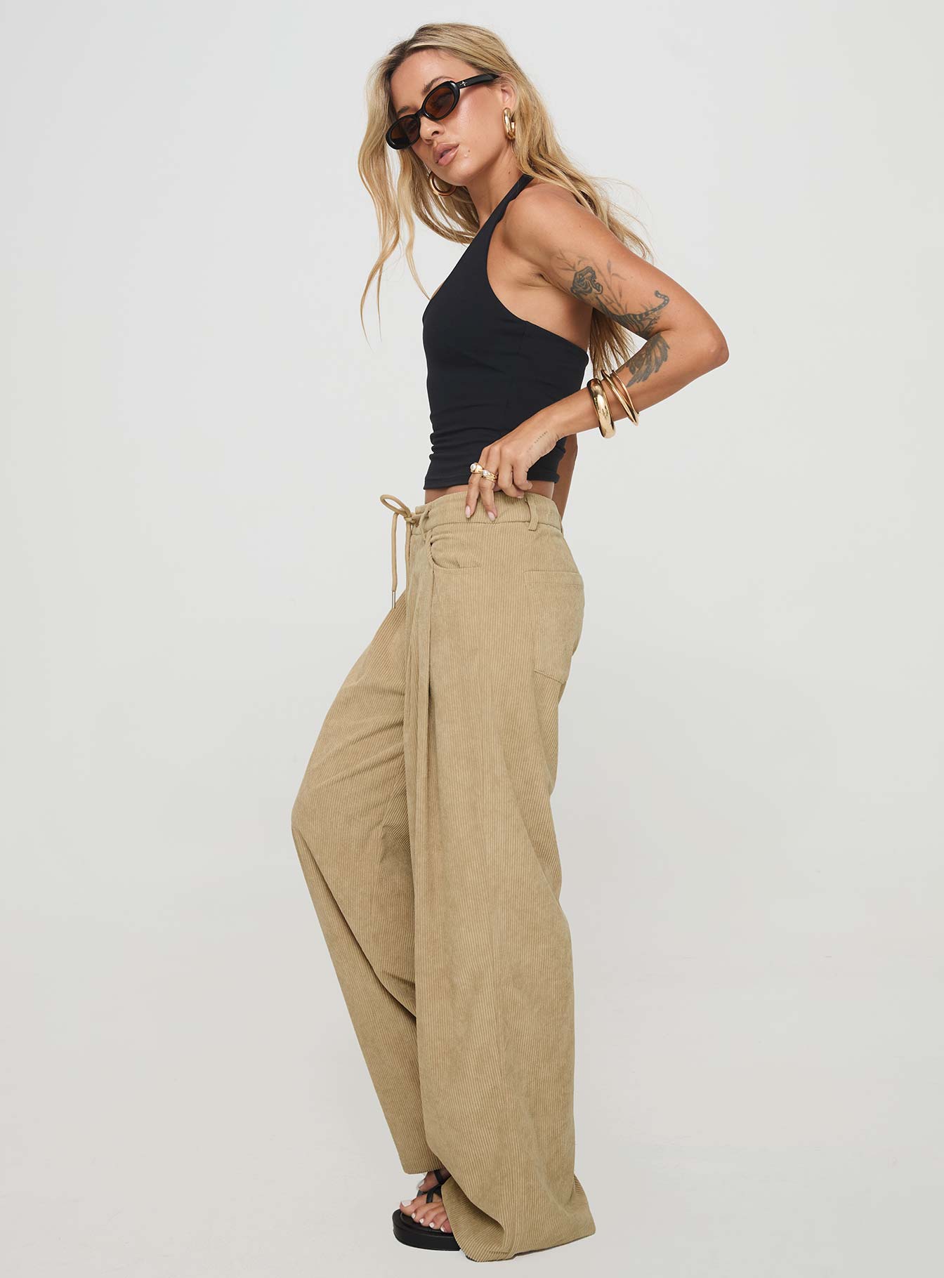 side view of model wearing Princess Polly Slouched Tie Up Pant Latte Low Rise Pants 