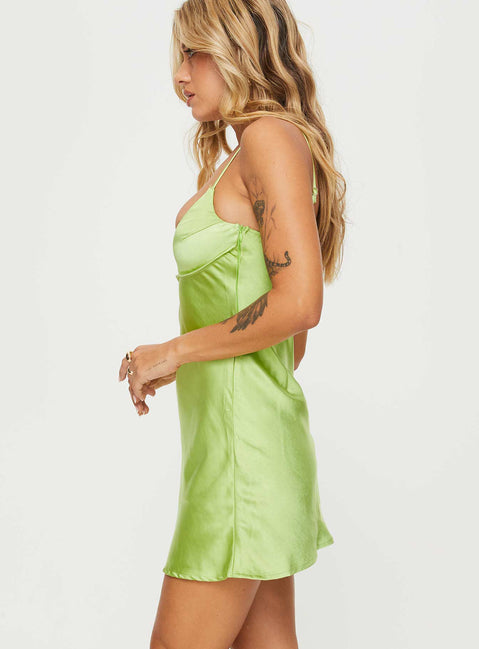 side view of model wearing Princess Polly Merinda Mini Dress Green Scoop Neck 