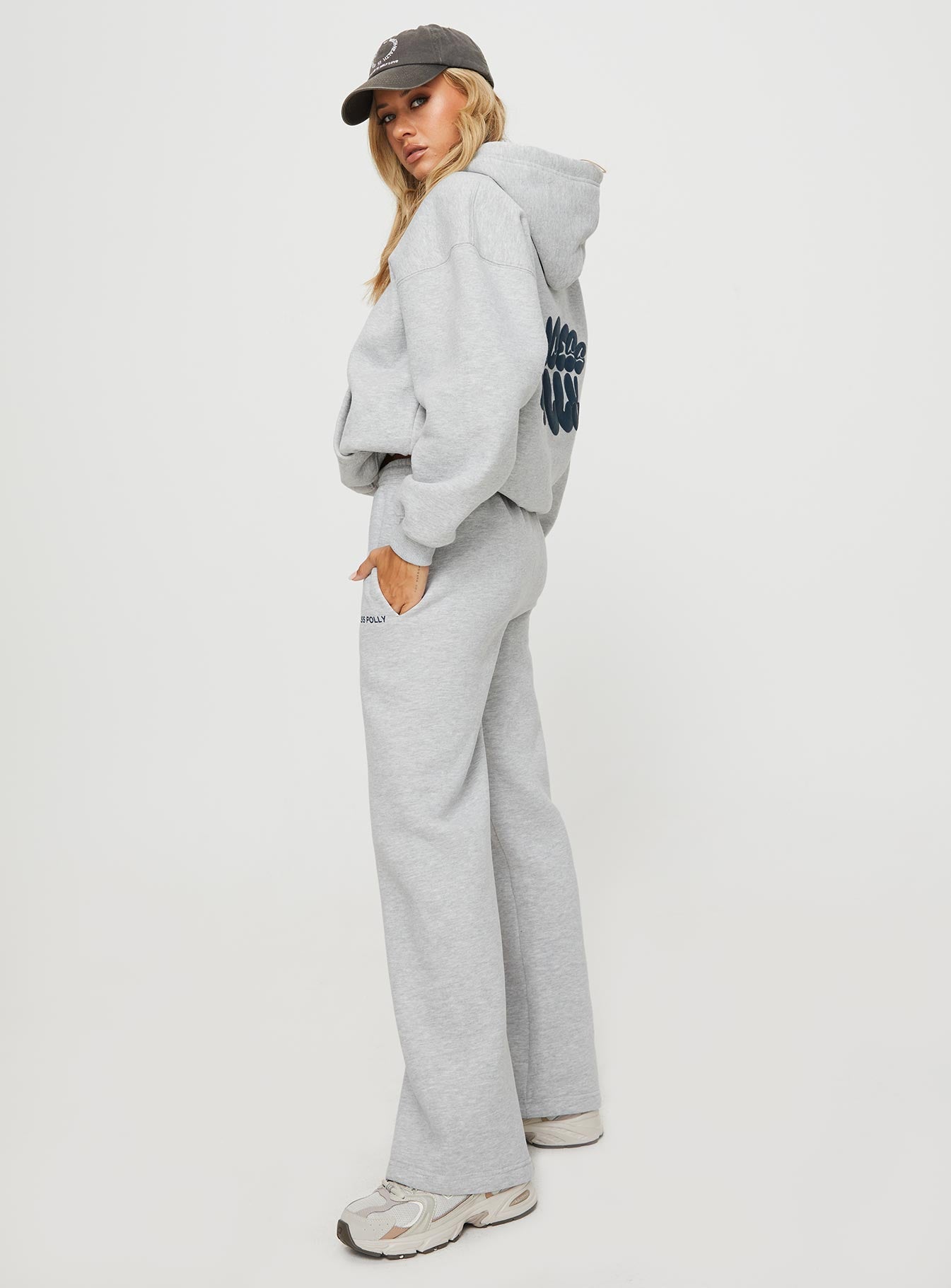 Front view of model wearing  front Princess Polly  Princess Polly Straight Leg Track Pants Text Grey Marle