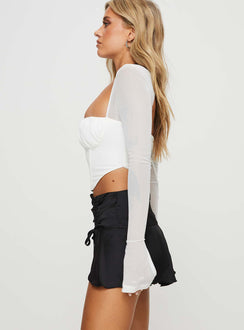 side view of model wearing Princess Polly Laurie Long Sleeve Top White Full Sleeves Square Neck 