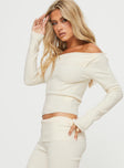 Long sleeve top Knit-like material, folded neckline, can be worn off the shoulder, split at side  Good stretch, unlined 