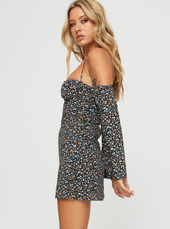 side view of model wearing Princess Polly Acer Long Sleeve Mini Dress Black / Floral Square Neck 