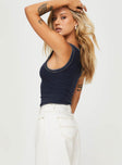 side view of model wearing Princess Polly Casado Top Navy Sleeveless Scoop Neck 