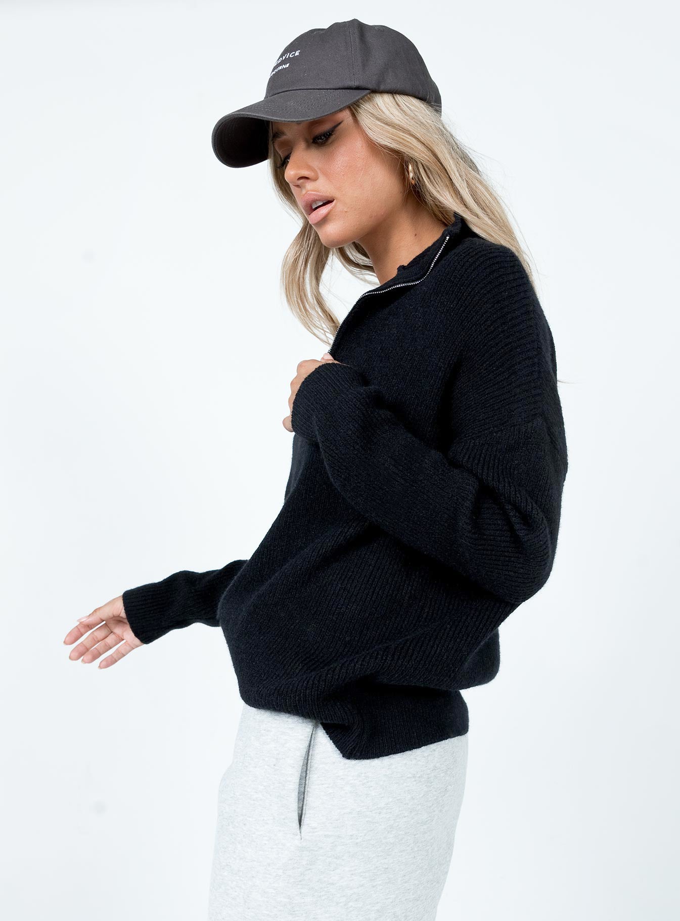 side view of model wearing Princess Polly Bessy Sweater Black regular 
