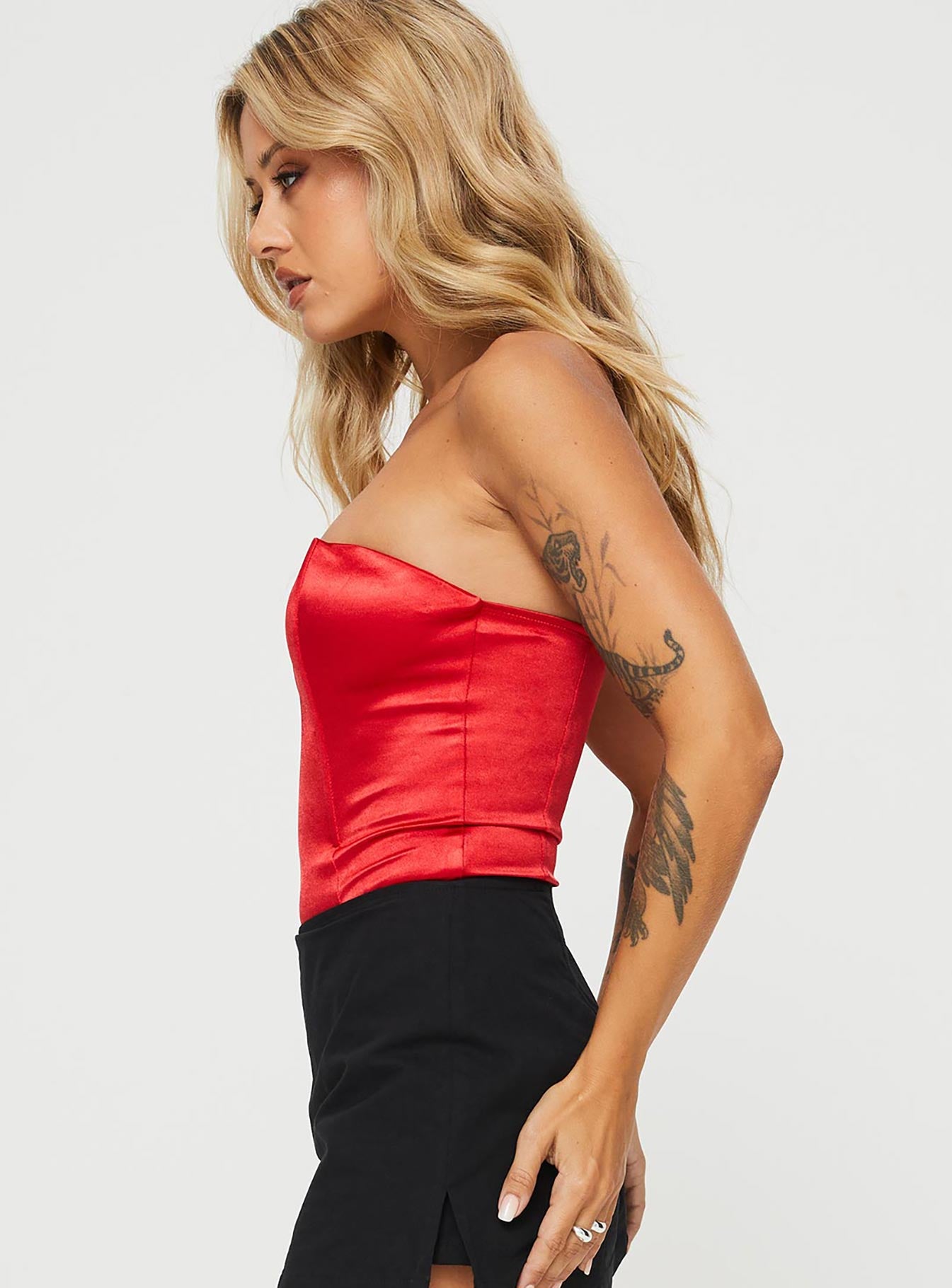 side view of model wearing Princess Polly Huttley Bodysuit Red Sleeveless Sweetheart 