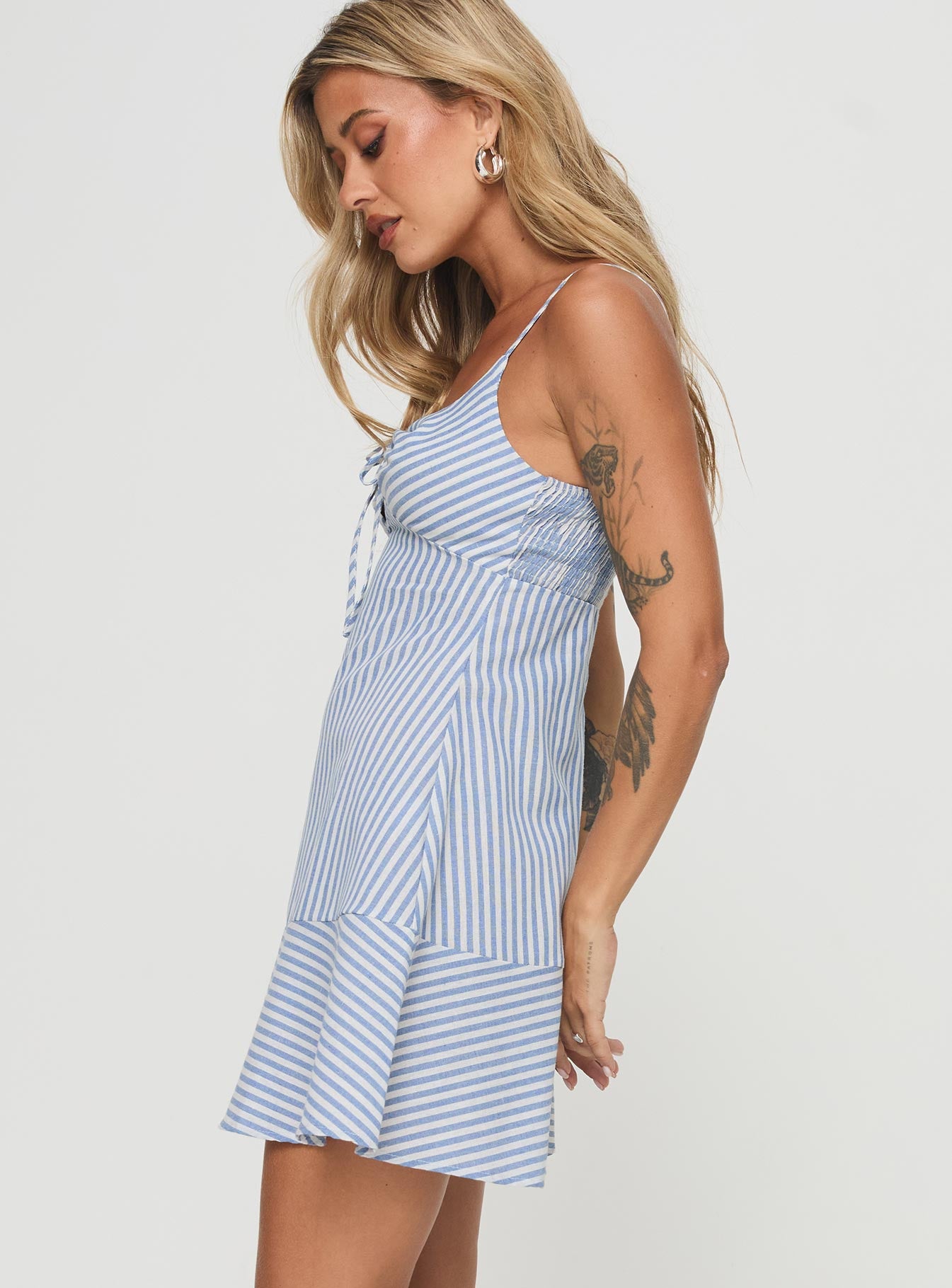 side view of model wearing Princess Polly Kearns Mini Dress Blue Stripe Scoop Neck 
