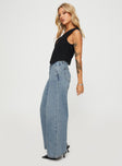 side view of model wearing Princess Polly Jewelz Wide Leg Jeans Light Wash Mid Rise 