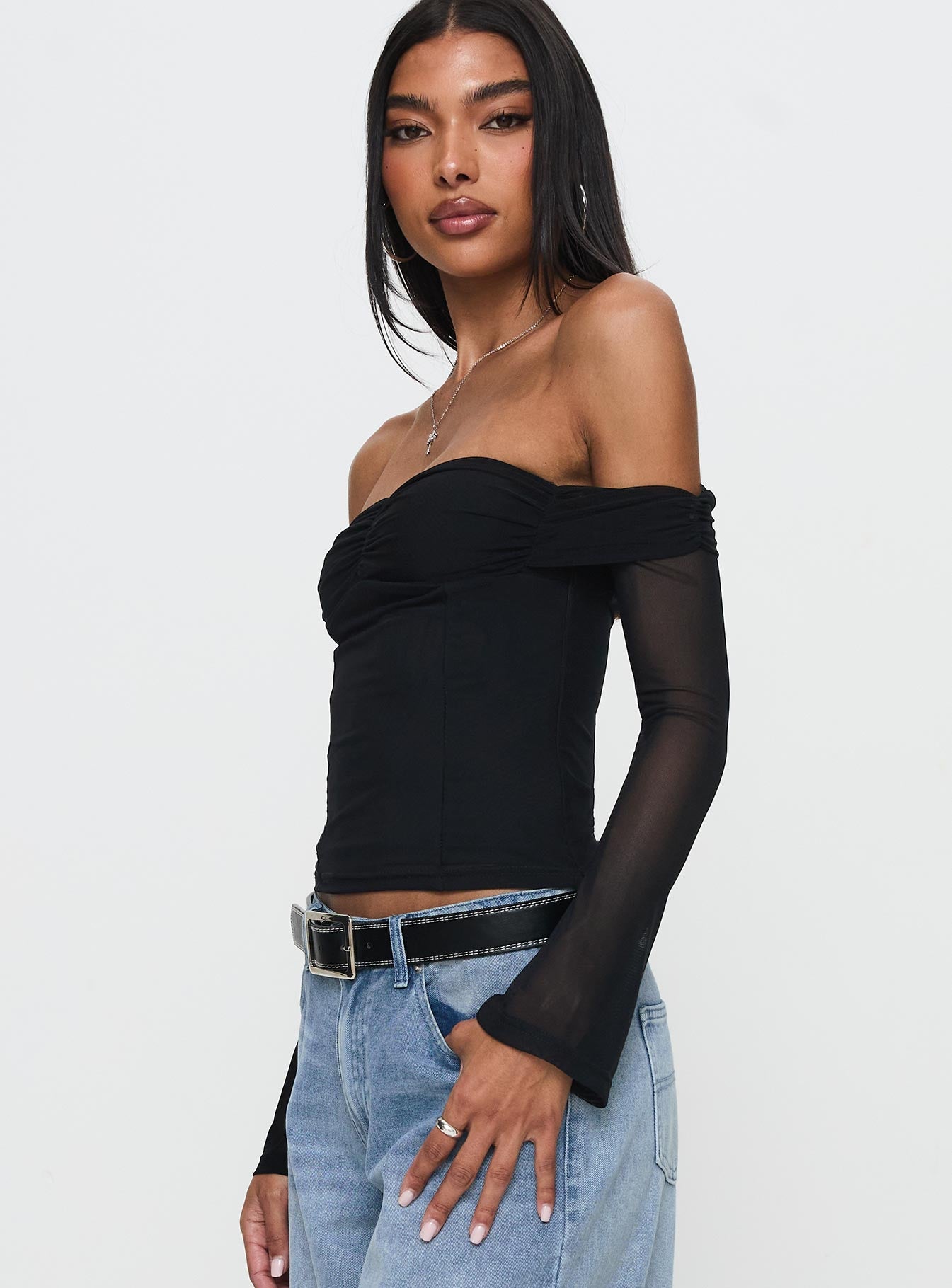 side view of model wearing Princess Polly Saelan Off Shoulder Long Sleeve Top Black Full Sleeves Sweetheart 