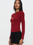 side view of model wearing Princess Polly Orlaith Cut Out Long Sleeve Top Burgundy Full Sleeves Crew Neck 