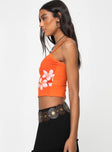 side view of model wearing Princess Polly Sunset Tank Orange Sleeveless Square Neck 