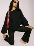 front view of model wearing Princess Polly Jubilee Flare Pants Black High Waisted Pants 