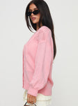 side view of model wearing Princess Polly Sezza Cable Knit Cardigan Baby Pink Long 