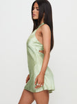 side view of model wearing Princess Polly Mysteria Halter Mini Dress Green Plunger 