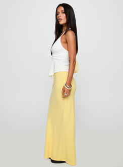   side view of model wearing Princess Polly Jodie Maxi Skirt Lemon Yellow Maxi 