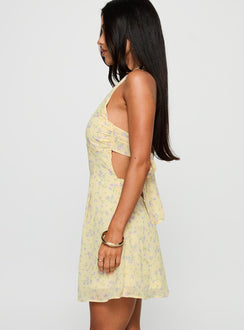 side view of model wearing Princess Polly Rosamie Halter Mini Dress Cream / Floral Square Neck 