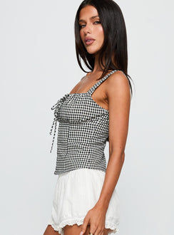 side view of model wearing Princess Polly Modern Girl Top Black Gingham Sleeveless Square Neck 
