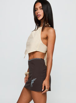   side view of model wearing Princess Polly Lonely Hearts Mini Skirt Brown Mini Skirts 