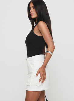   side view of model wearing Princess Polly Chillders Denim Mini Skirt White Mini Skirts 