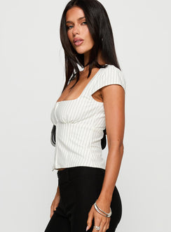 side view of model wearing Princess Polly Santa Cruz Zip Through Top White Pinstripe Short Sleeves Square Neck 