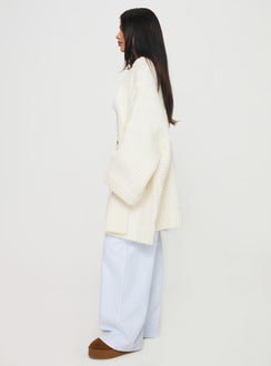 side view of model wearing Princess Polly Paisleigh Cable Knit Cardigan Cream Long 