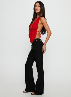 side view of model wearing Princess Polly Yevina Eyelet Flare Pant Black Low Rise Pants 