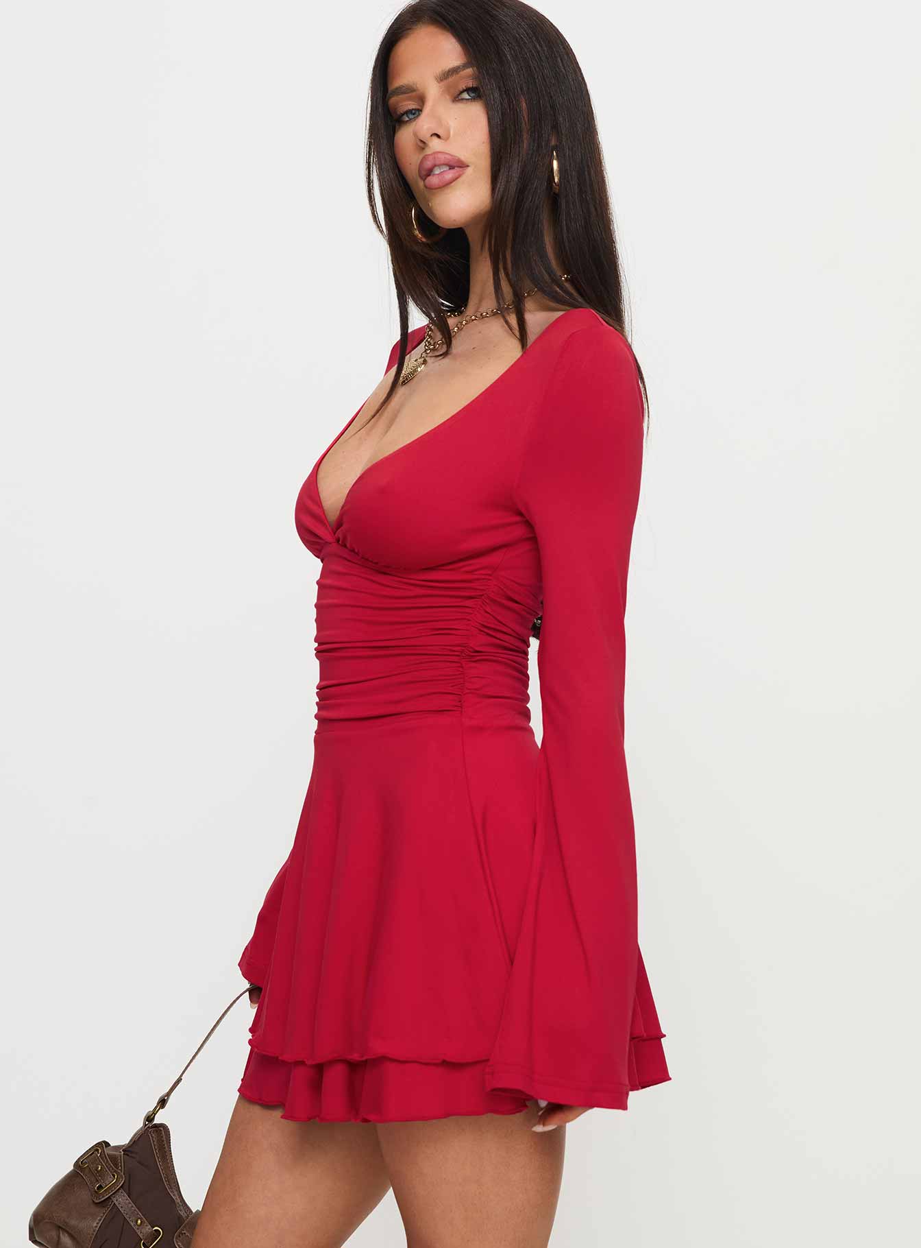 side view of model wearing Princess Polly Canino Long Sleeve Mini Dress Red Plunger 