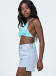 side view of model wearing Princess Polly Leonie Lightwash Denim Shorts Lower Impact High Waisted Shorts 