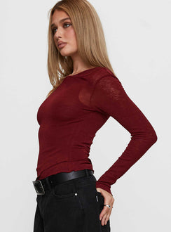 side view of model wearing Princess Polly Lefort Long Sleeve Top Burgundy Full Sleeves Crew Neck 