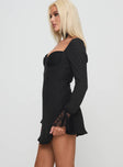 side view of model wearing Princess Polly Softer Side Long Sleeve Mini Dress Black Sweetheart Neckline 