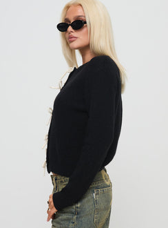 side view of model wearing Princess Polly Rosalee Cardigan Black / White Cropped 