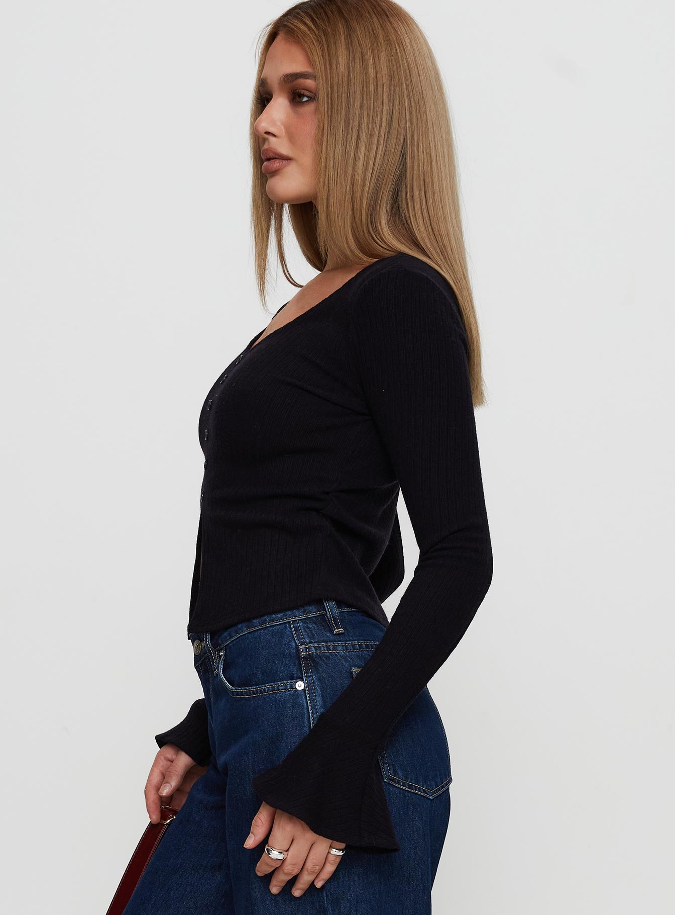 side view of model wearing Princess Polly Take My Time Long Sleeve Top Black Full Sleeves V-Neck 