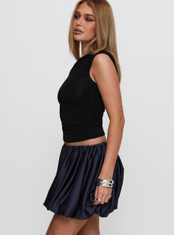   side view of model wearing Princess Polly Rubee Bubble Hem Mini Skirt Navy Mini Skirts 