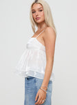 side view of model wearing Princess Polly Fireflies Top White Sleeveless Square Neck 