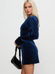 side view of model wearing Princess Polly Syrene Velvet Mini Dress Navy Boat Neck 